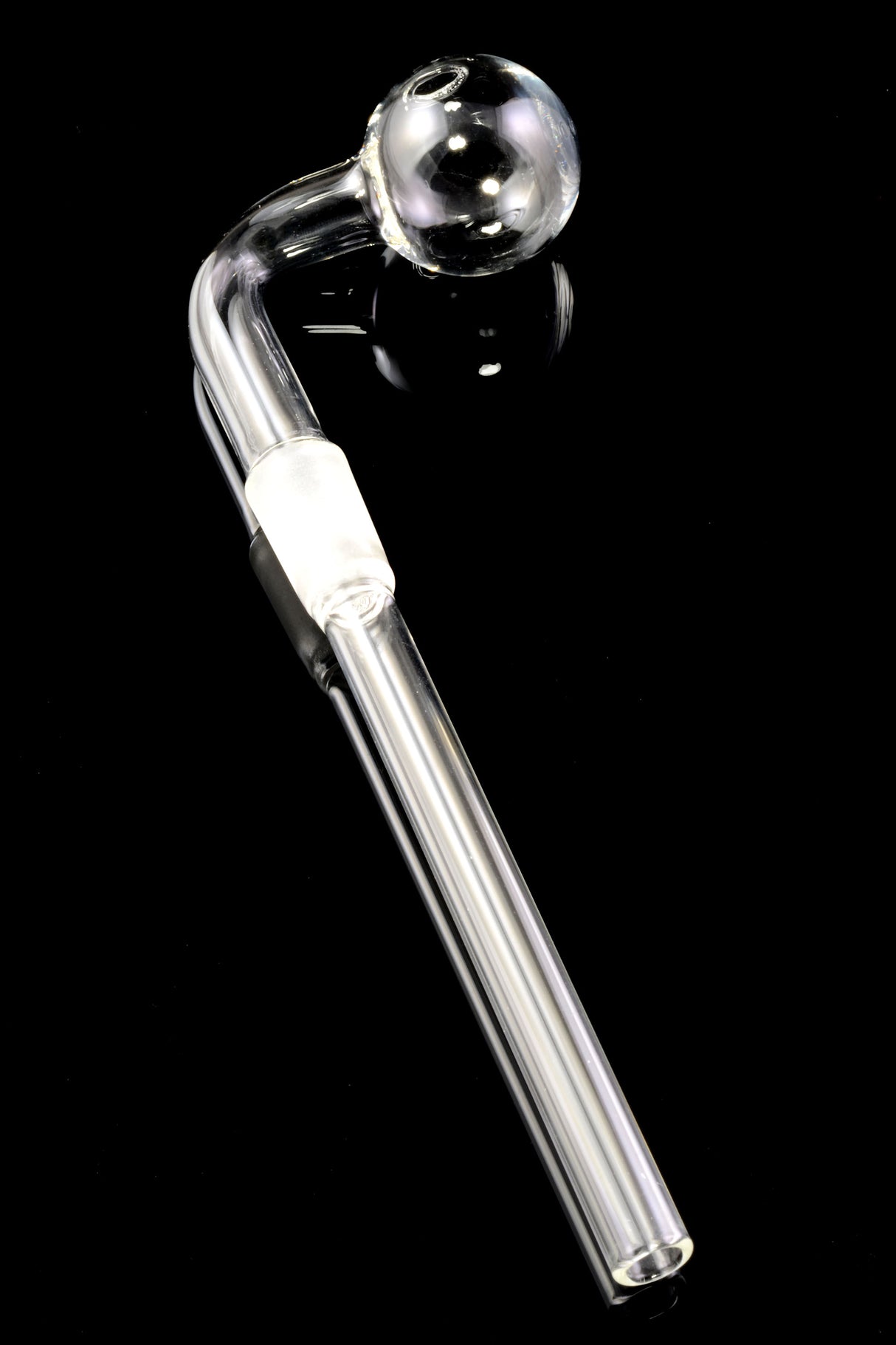 Angled view of clear 14.5 mm glass-on-glass oil burner downstem on black, frosted joint and round globe bowl with straight mouthpiece.
