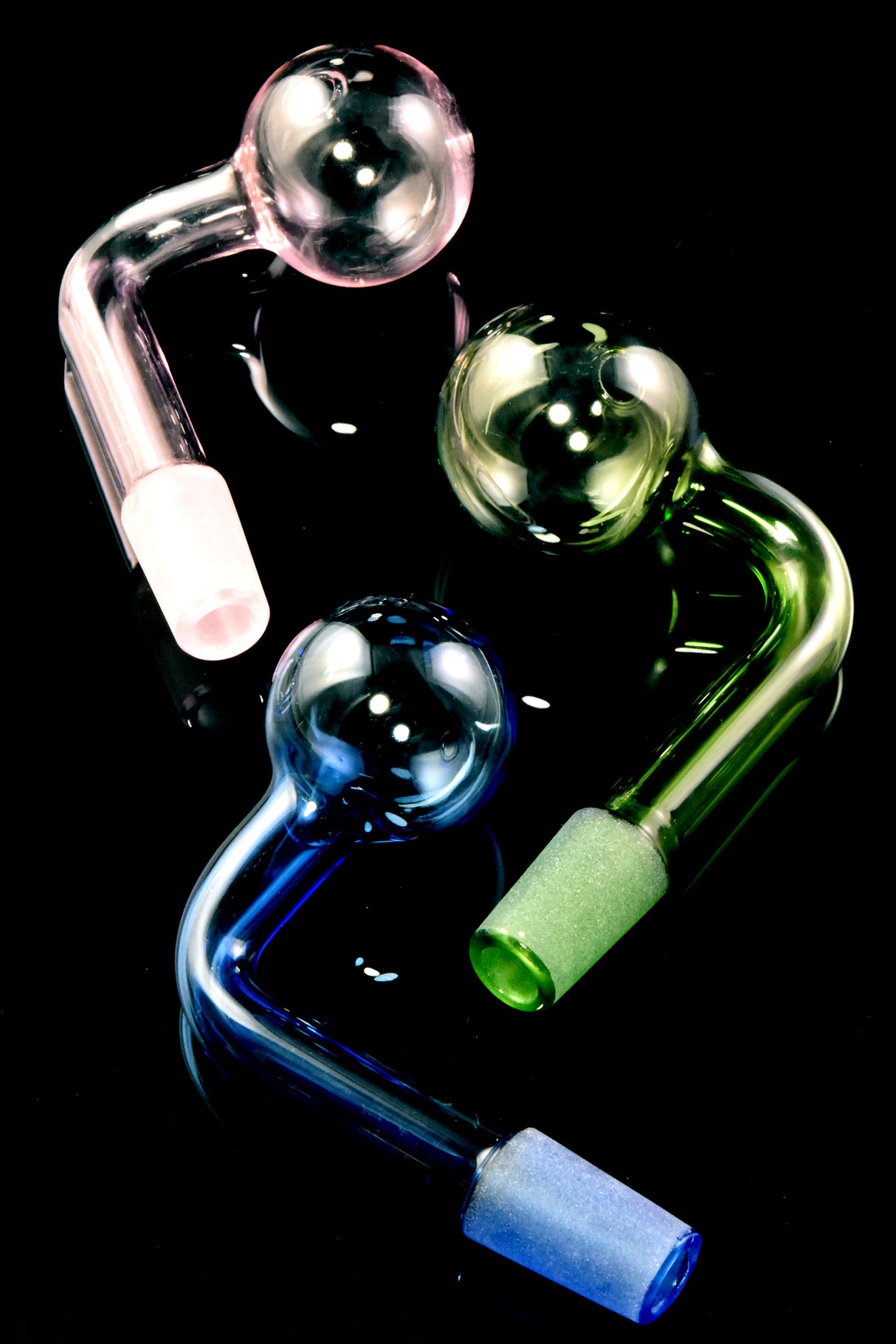 US-made 14.5 mm male colored glass oil burner attachment with clear globe and L-shaped stem; frosted joint; approx. 20 g.