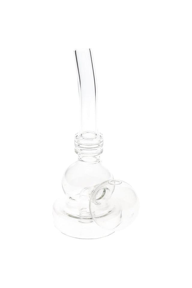 5.5″ clear glass oil burner rig with rounded base and angled mouthpiece; compact design for personal use.