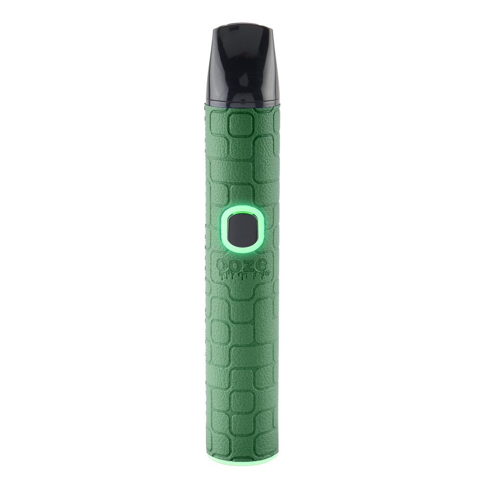 Green Ooze Pinch dry herb vaporizer with textured grip pattern, black mouthpiece, and lit display button