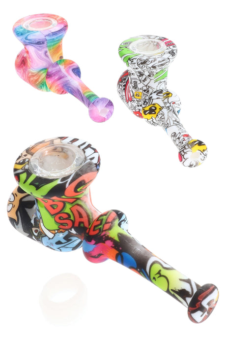 Colorful decal silicone hammer hand pipe with removable glass bowl and small matching stash jar, assorted graffiti patterns on white background.