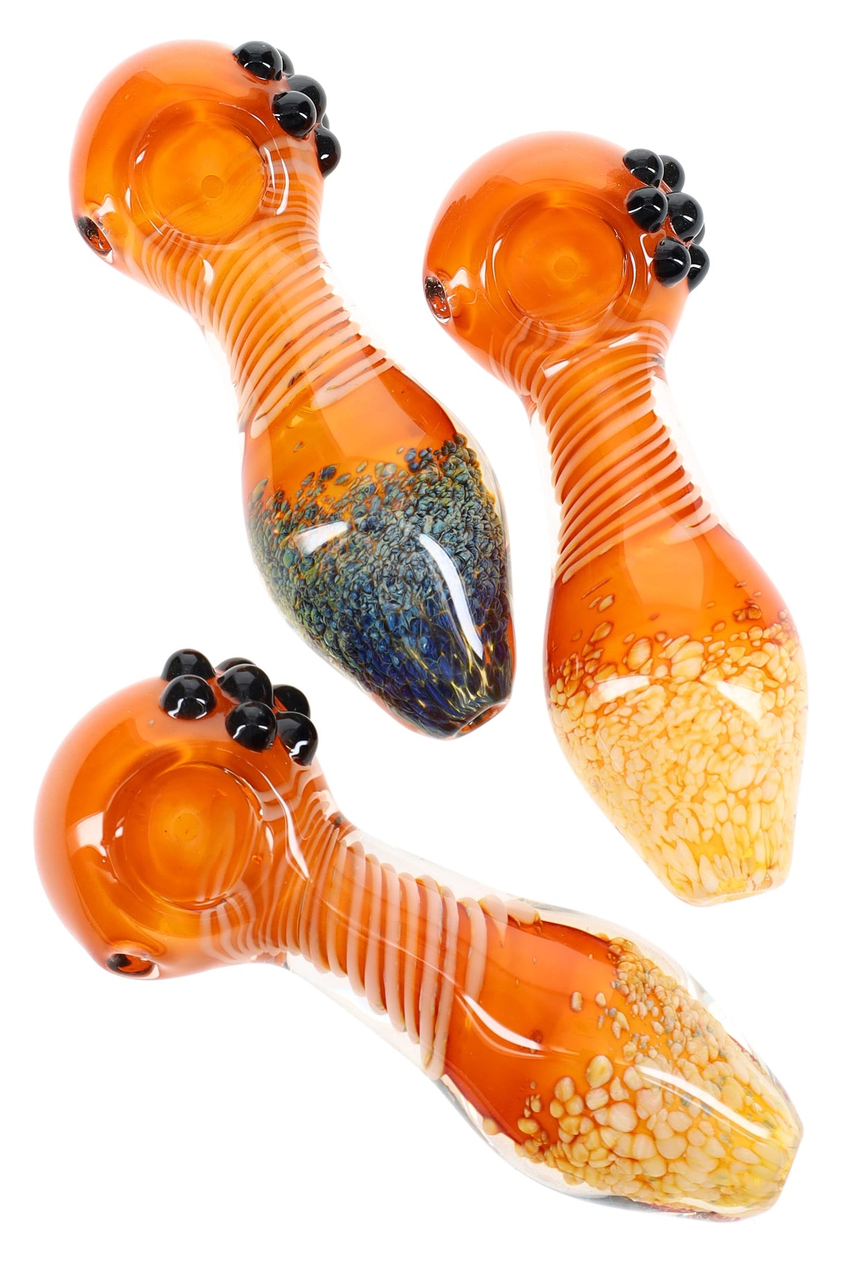 4.5″ gold-fumed glass spoon pipe with striped neck, frit mouthpiece, side carb, and black marble roll-stops; thick, color-changing amber finish.