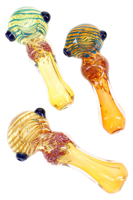 4″ color-changing silver fumed frit striped glass hand pipe with bold spiral accents; compact spoon design around 75 g for smooth dry herb hits.