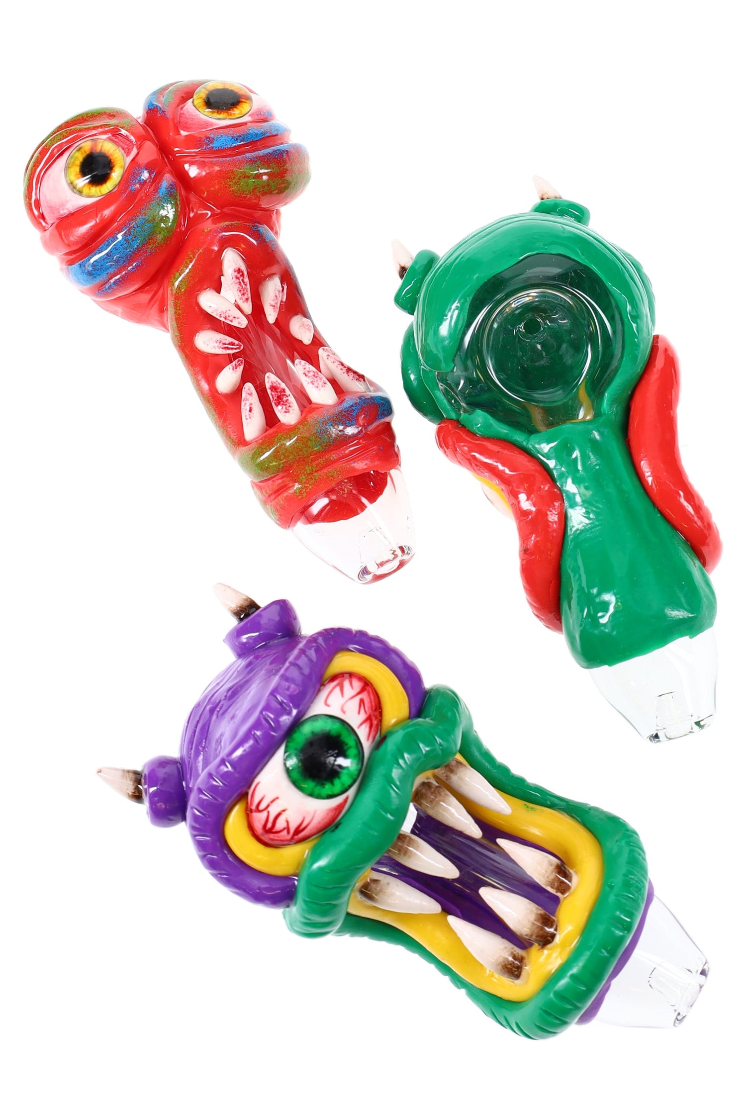 4½″ monster glass spoon pipe with sculpted resin fangs and eyeballs on a clear body; assorted colors, about 110 g, sold individually.