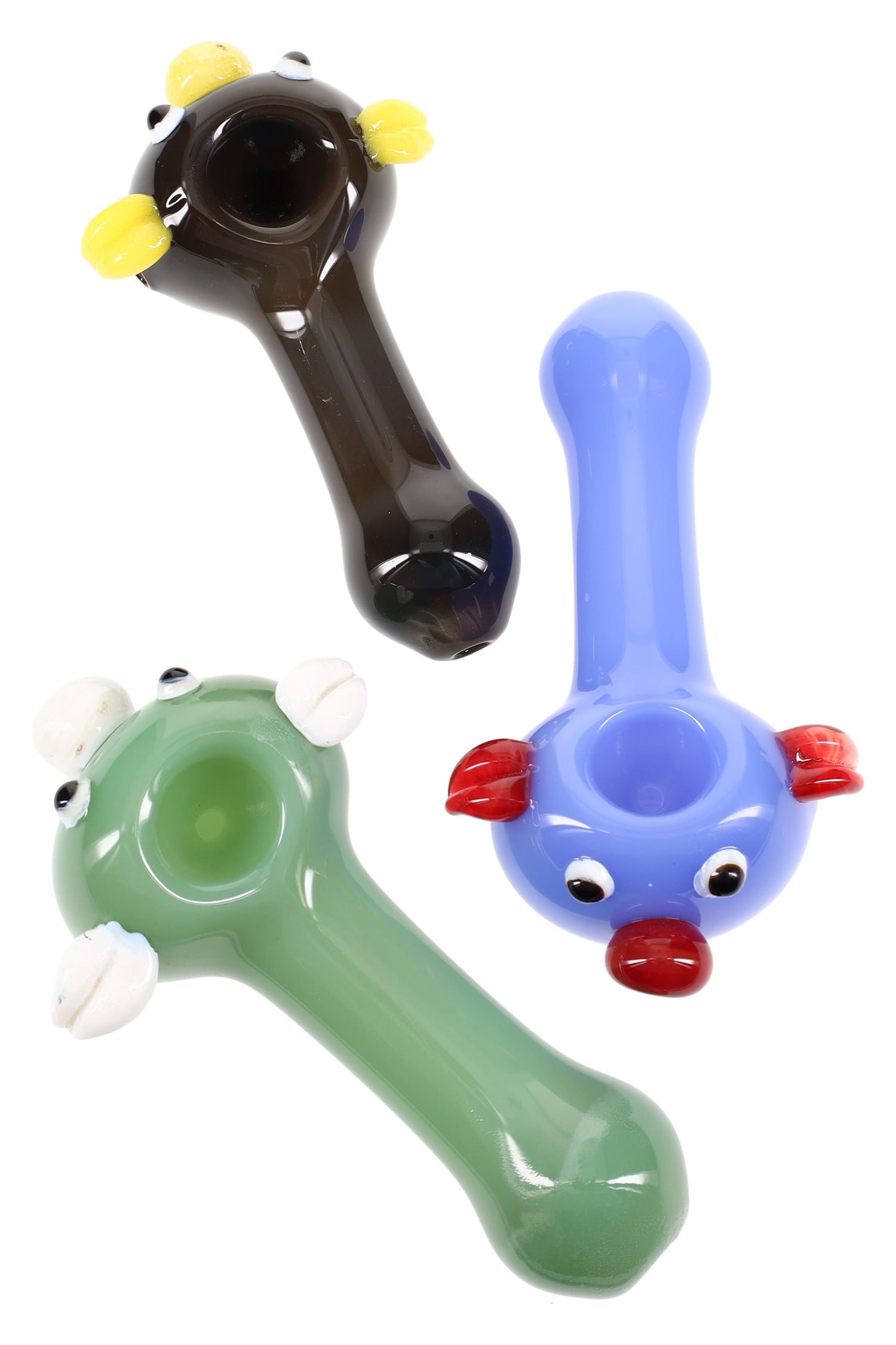 4½″ colored glass pig face spoon pipe with sculpted ears, snout, and eyes on a compact hand pipe body in assorted colors.