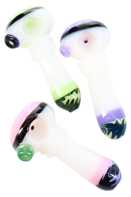 4″ white glass spoon with neon accents, reverse wig wag bowl, and ringed handle; assorted colors, approximately 100 g, sold individually.