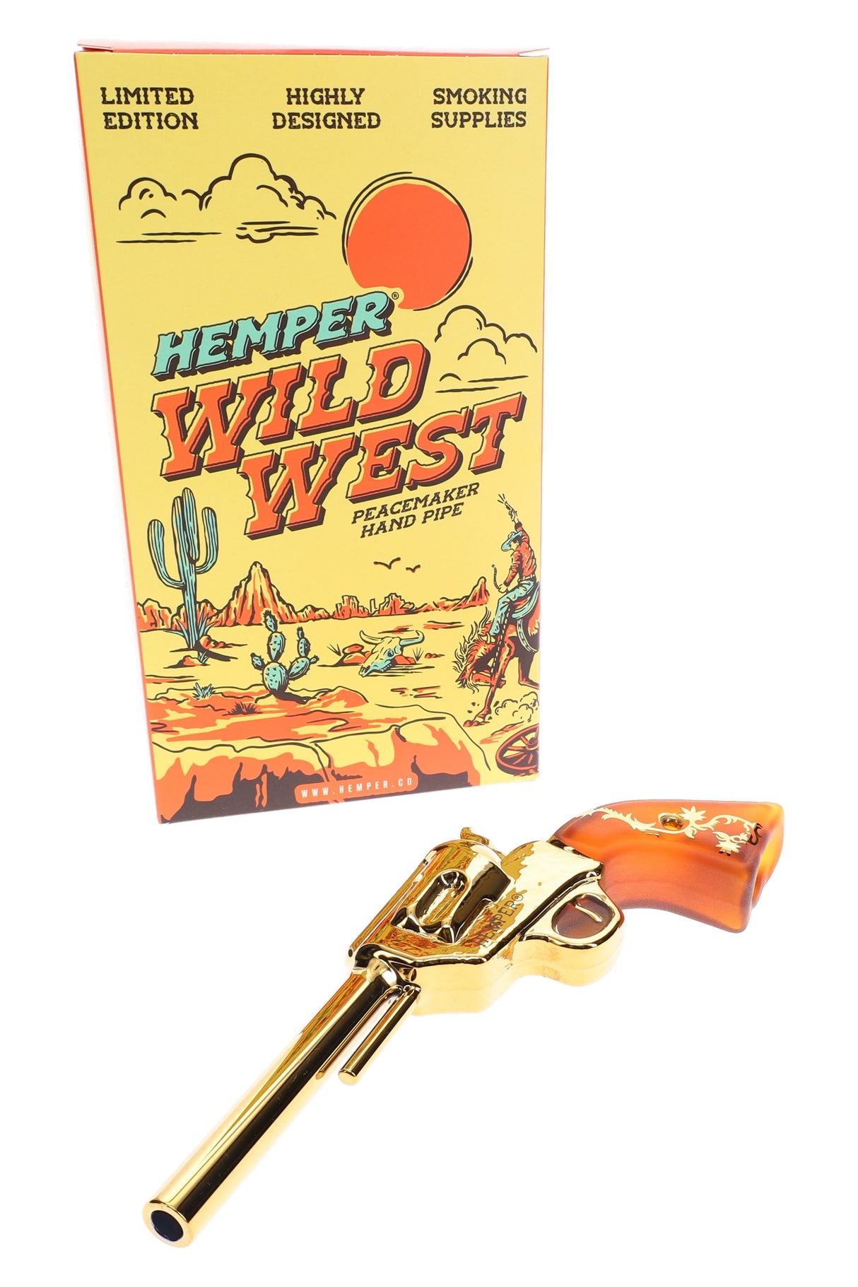 Hemper Peacemaker revolver glass hand pipe resting in front of its yellow Wild West box on a white background.