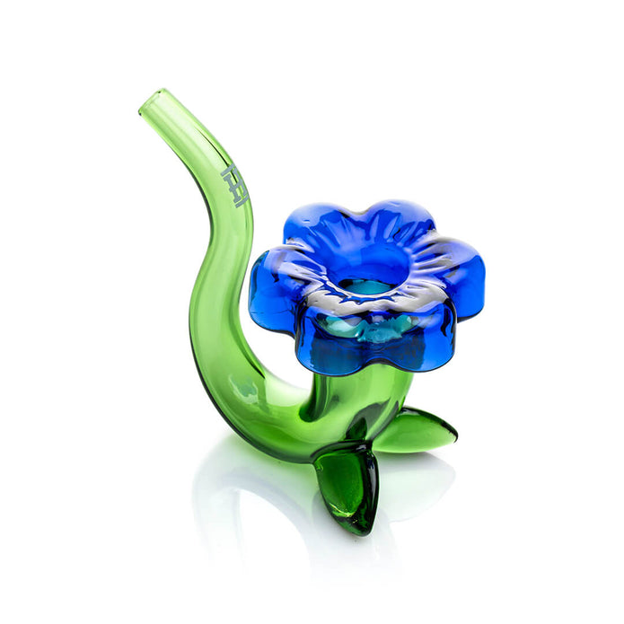 Angled view of green glass Sherlock hand pipe showing blue flower bowl top, smooth mouthpiece curve, and palm-friendly size