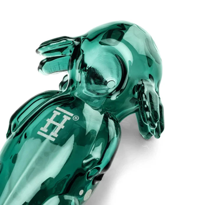 Close-up of the HEMPER Axolotl Hand Pipe showing its recessed glass bowl, sculpted gills, and H logo