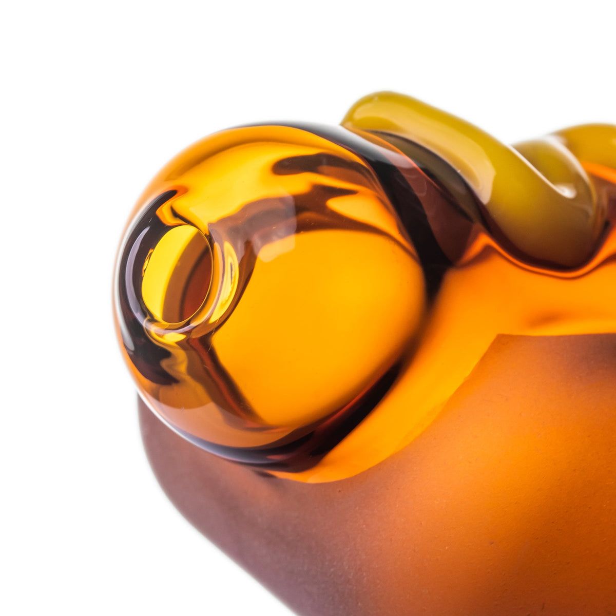 Close-up of BigFun! Glizzy glass hand pipe mouthpiece with rounded amber borosilicate glass opening