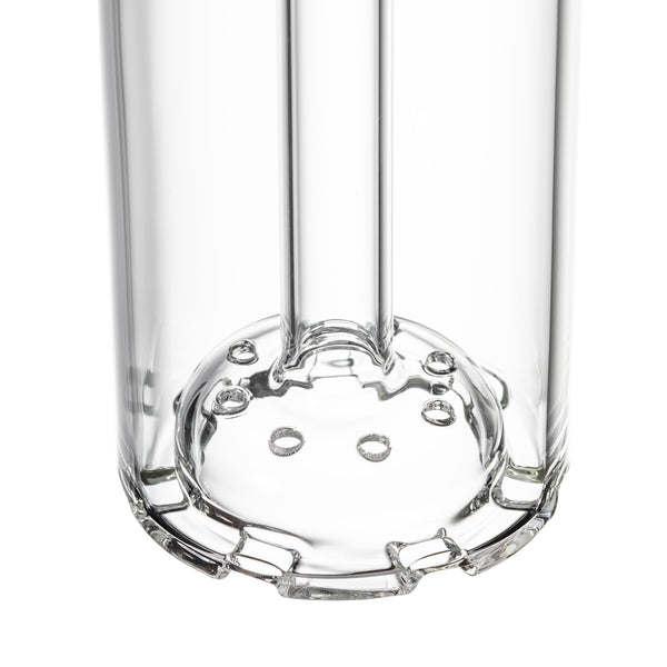 Detail of disc percolator at base of clear glass gravity bong, multi-hole diffusion plate for smoother filtration.