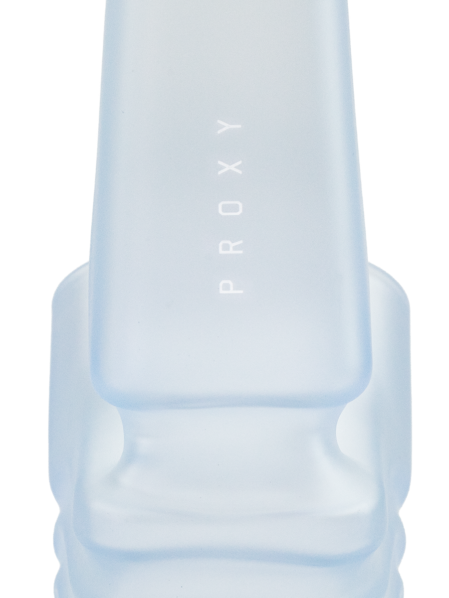 Close-up of Haze Puffco New Proxy Wizard back section showing frosted blue glass, sculpted grip and subtle PROXY logo on the stem.