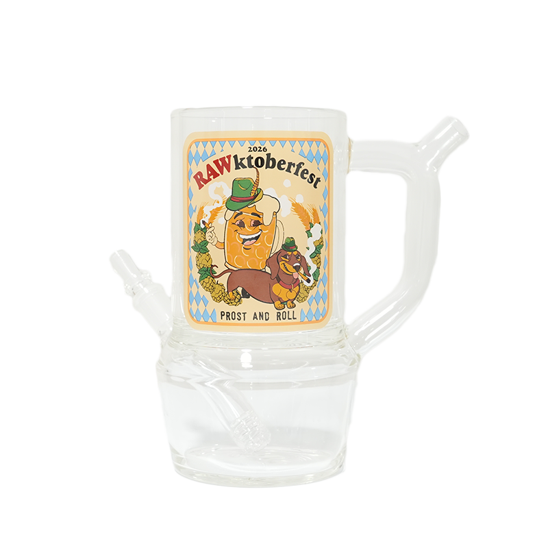 Close-up of RAWktoberfest glass stein showing clear handle, chamber, downstem, and front label