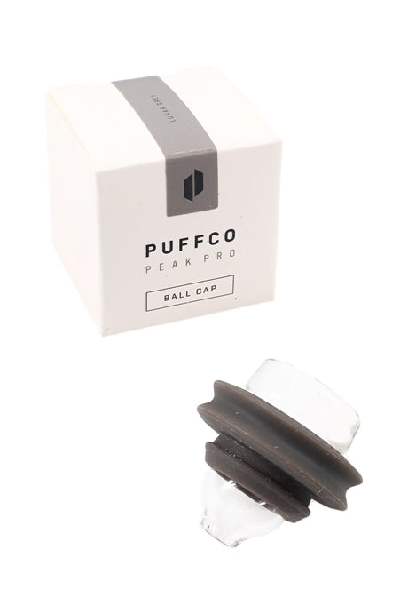 Lunar grey Puffco Peak Pro ball cap with clear glass top and dark silicone seal, pictured alongside the labeled box.