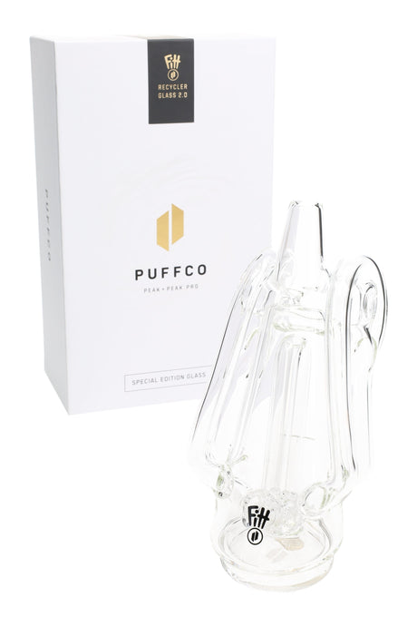 Clear Ryan Fitt Recycler Glass 2.0 attachment beside Puffco Special Edition box, compatible with Peak and Peak Pro devices.