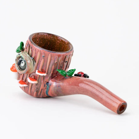 Side view of Hootie Proxy Sherlock showing tree-bark texture, knot-hole owl detail, and leafy accents along the curved stem.
