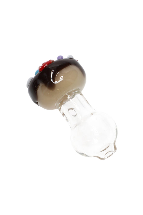 Donut-themed Puffco Peak Pro glass ball cap, chocolate glaze with multicolor sprinkles and a clear rounded cap section, on white background.
