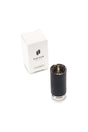 Puffco Plus replacement chamber beside white retail box, textured black grip and metal bowl shown, genuine part for concentrate pen.