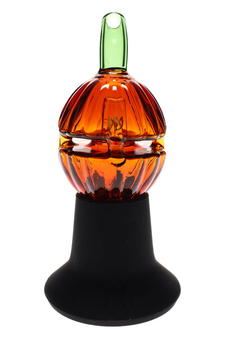 Pumpkin “Gourdy” top displayed on a black Dock stand to show upright presentation for Puffco Pivot users.