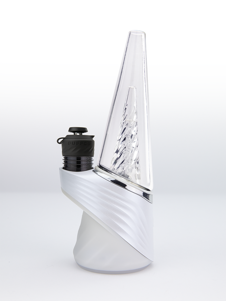 White Puffco Peak Pro device with clear glass cone and matching black 3D XL chamber installed on the side
