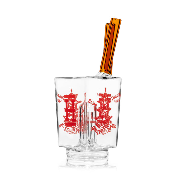 Side profile of takeout Puffco Peak glass top highlighting noodle-box silhouette and tall mouthpiece shape for smooth draw