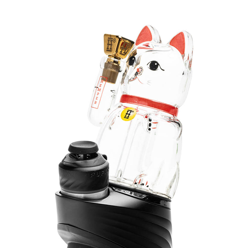 Side angle Lucky Money Cat Peak top installed on device, clear maneki-neko body with red accents and gold mouthpiece
