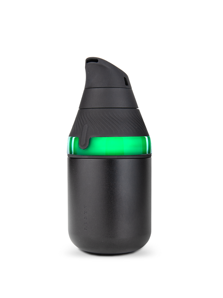 Front view of Puffco Proxy Core Kit in Onyx with illuminated chamber window and centered control button