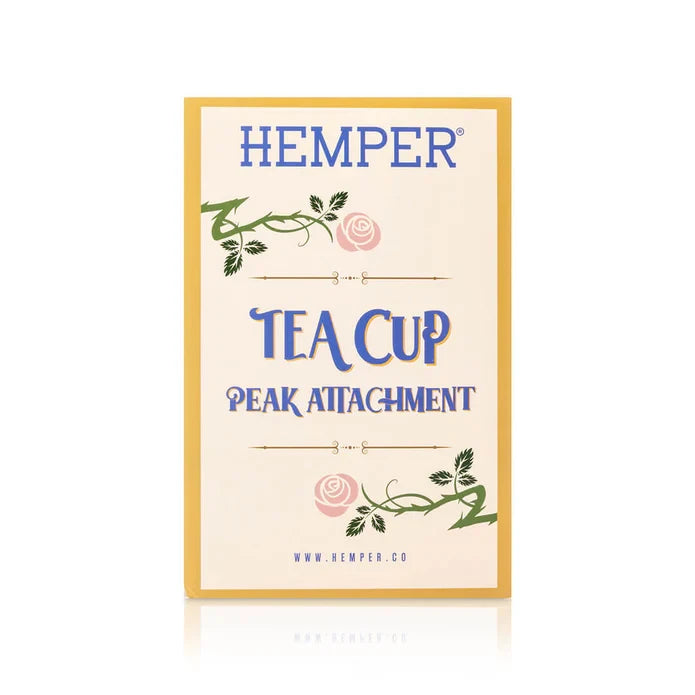Cream HEMPER Tea Cup Peak Attachment retail box with a yellow border, rose artwork, and blue lettering