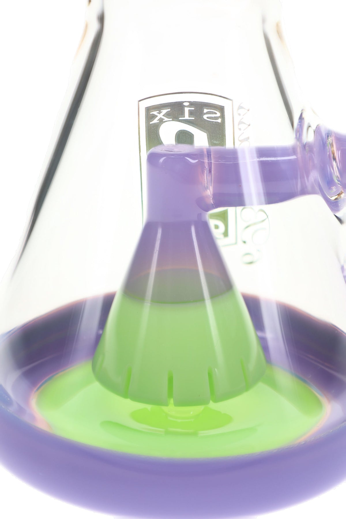 Close-up of purple and lime-green showerhead percolator inside a clear 6B Glass beaker bong.