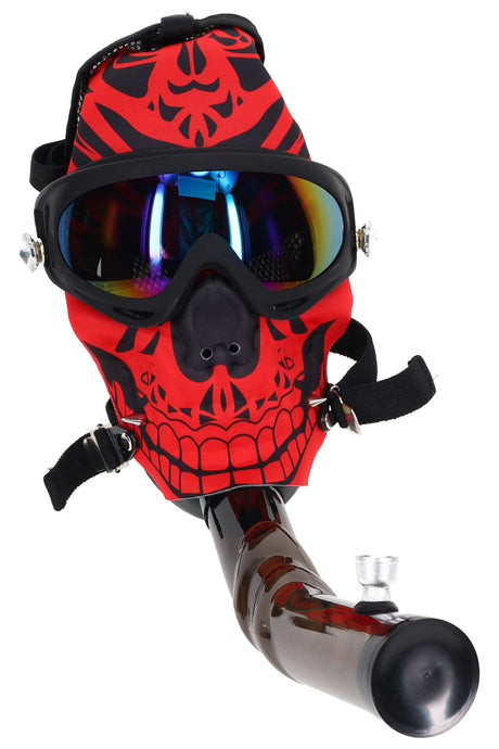 Gas mask bong with red skull mask, mirrored goggles, adjustable straps, and attached acrylic water pipe with metal bowl.