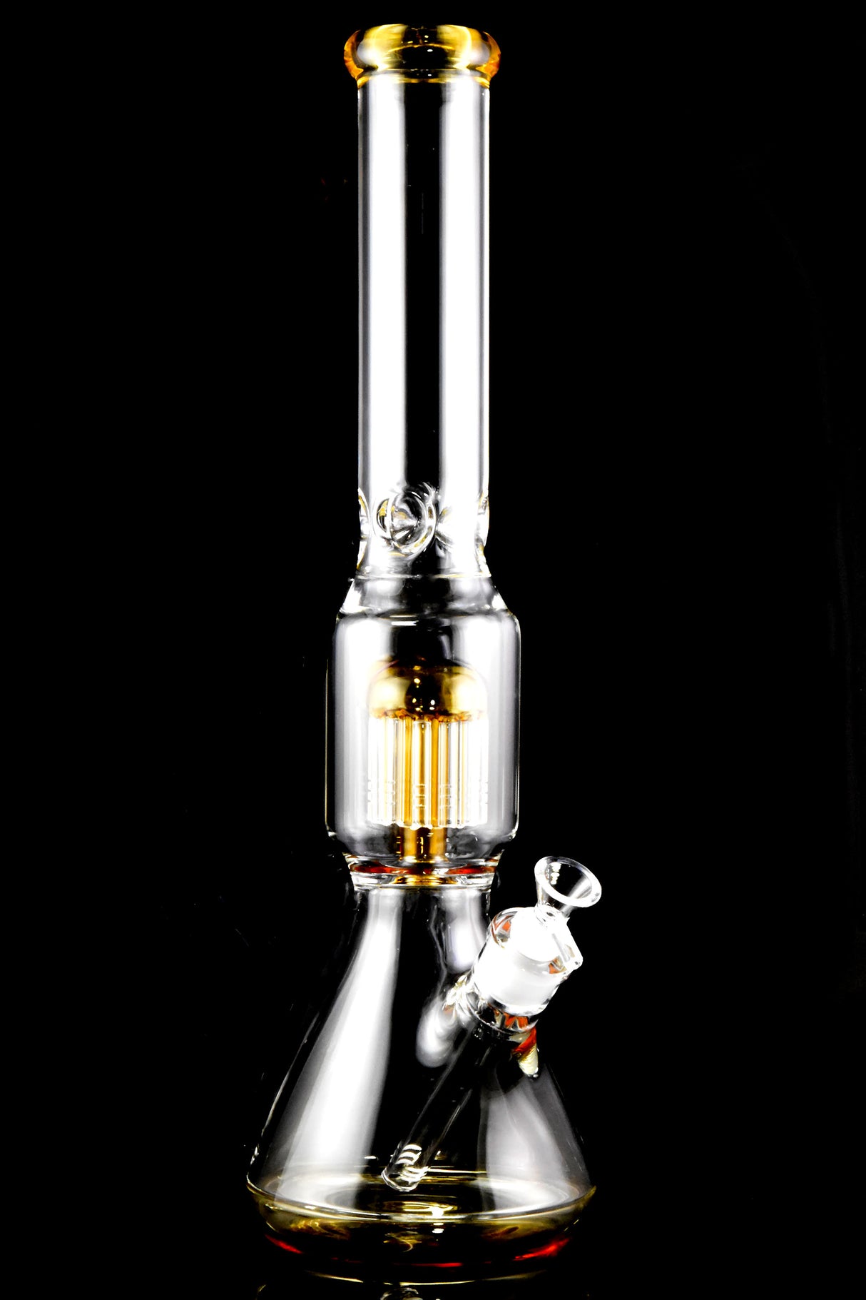 Amber-accent 18-inch glass beaker bong on black background highlighting tree perc and beaker base.