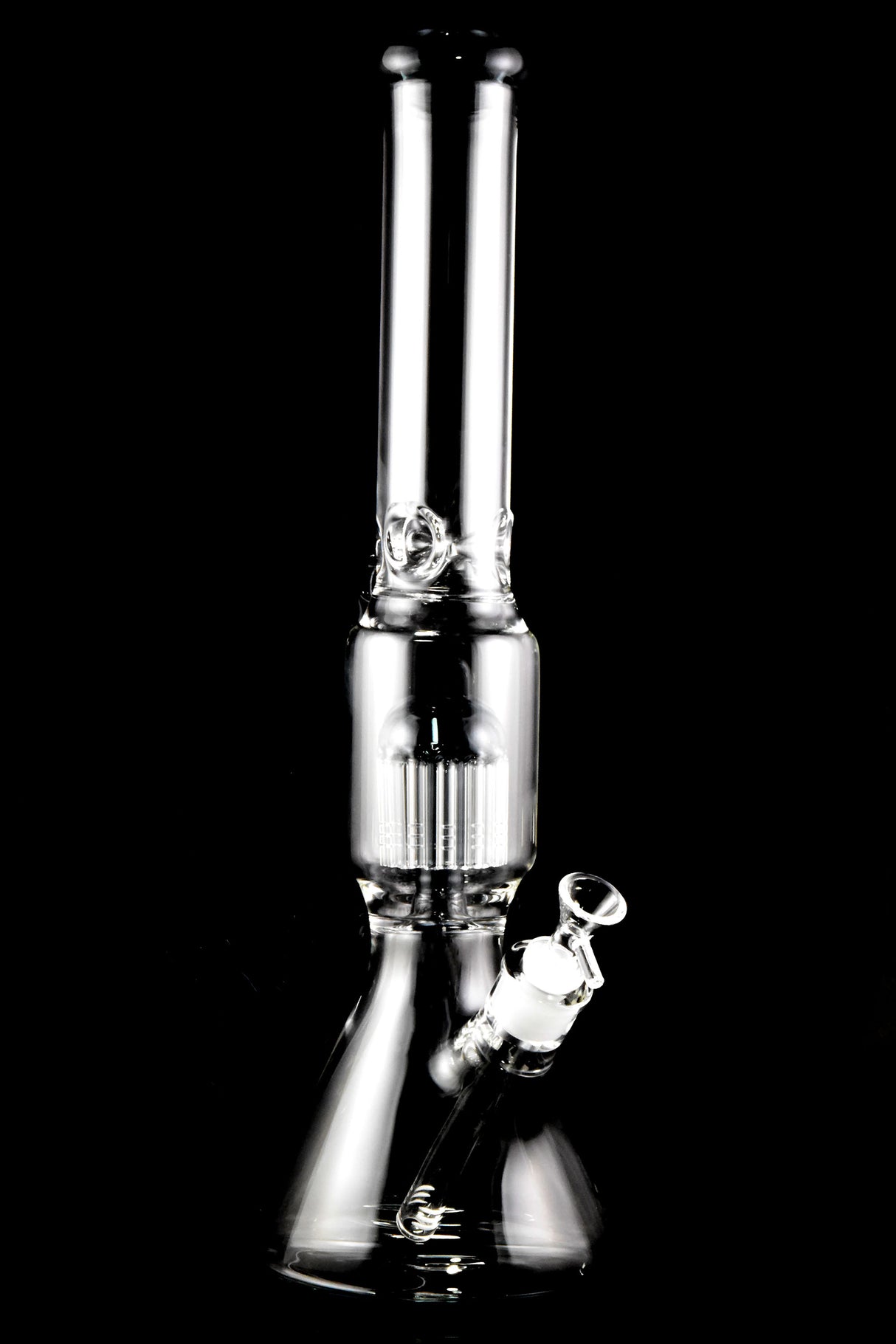 Clear 18-inch glass beaker bong on black background, showcasing multi-arm tree perc and ice pinch.