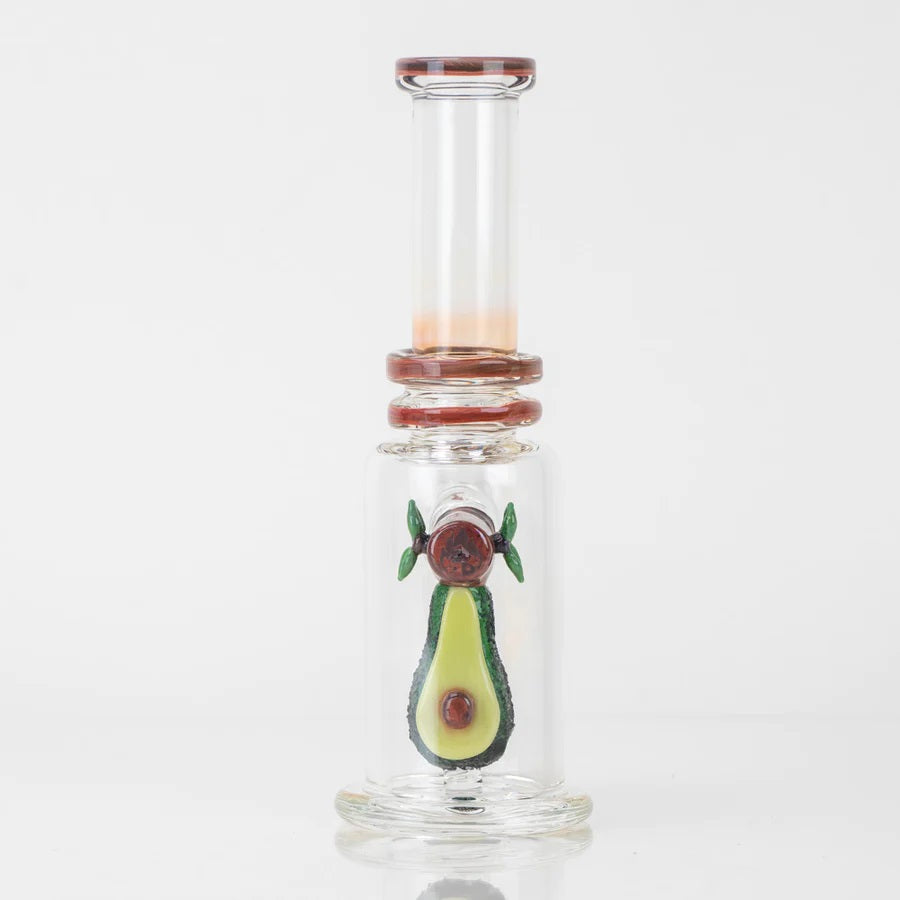 Front view of avocado mini tube highlighting cut-side avocado detail centered in the chamber, no bowl included.