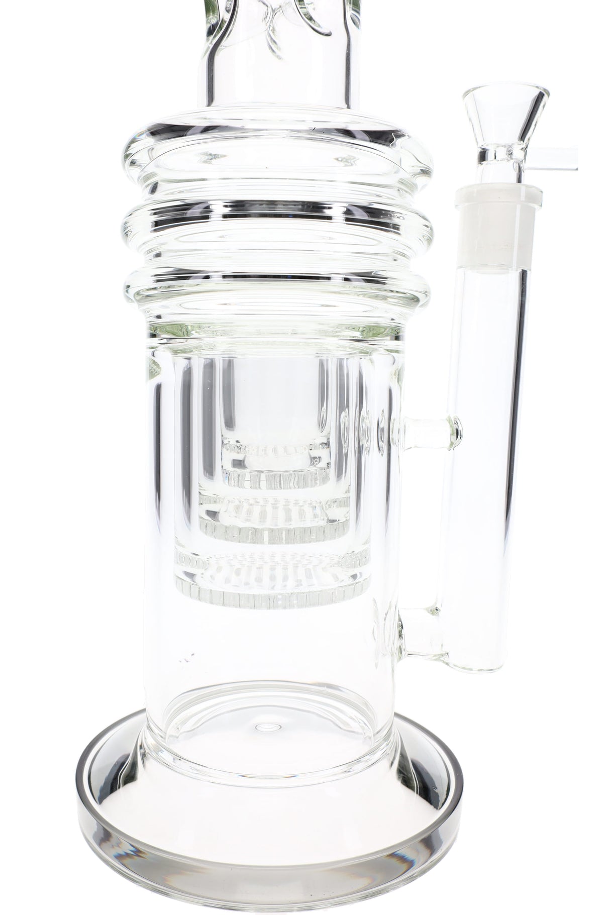 Close-up of honeycomb chamber and ribbed mid-section on an 18″ straight tube bong with glass-on-glass joint.