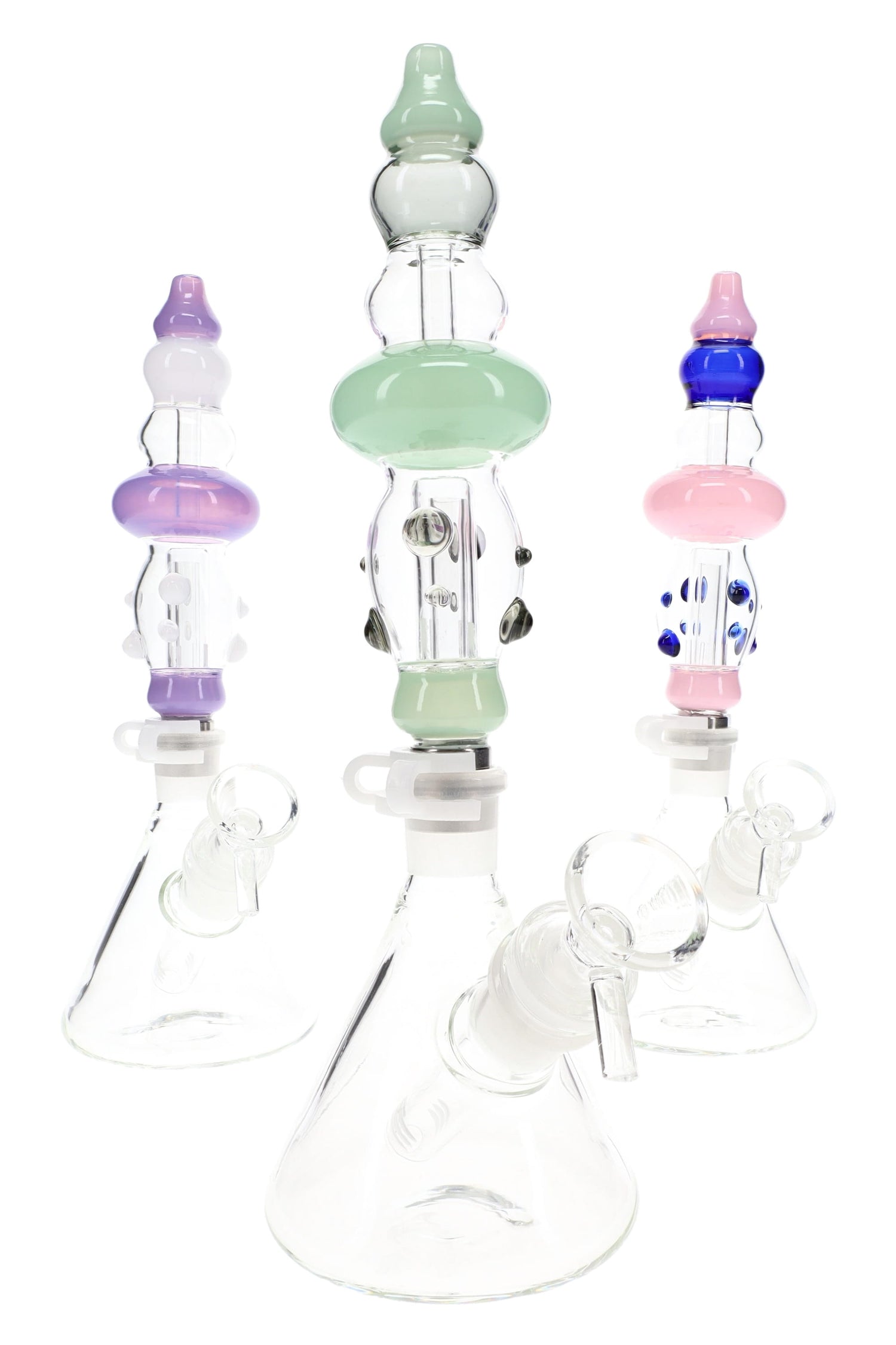 Three assembled Duo Namics kits in assorted pastel colors, each with clear beaker base and matching colored body section.