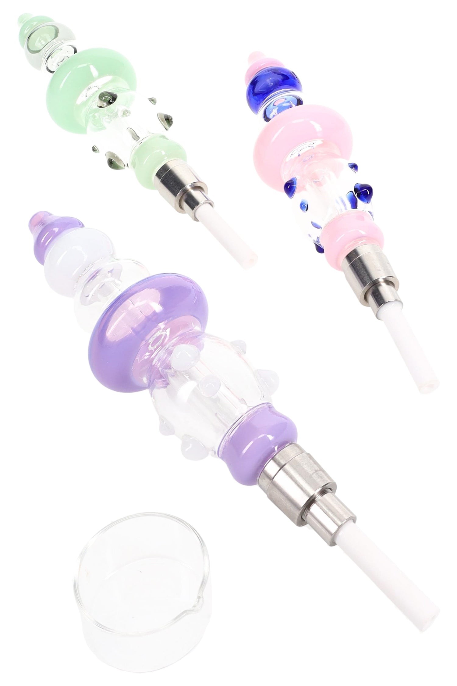 Dab straw configuration showing three colored glass bodies with heated tips attached and a small glass concentrate dish.