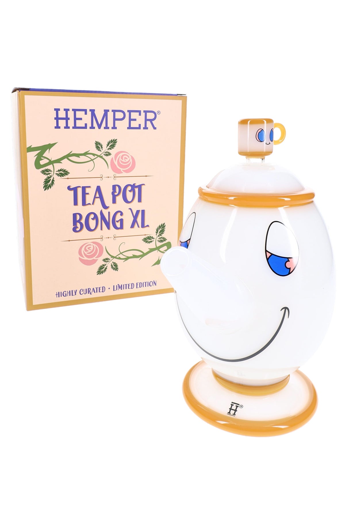 Hemper Tea Pot XL character glass bong standing beside pastel Tea Pot Bong XL box, ready for display on a clean white backdrop.