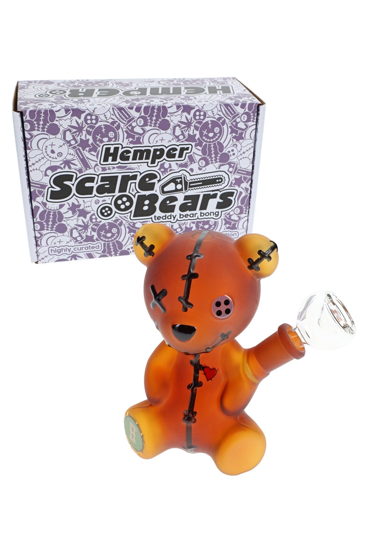 Hemper Scare Bears 5.5-inch teddy bear bong posed in front of purple Scare Bears box, frosted amber body with stitched graphics.