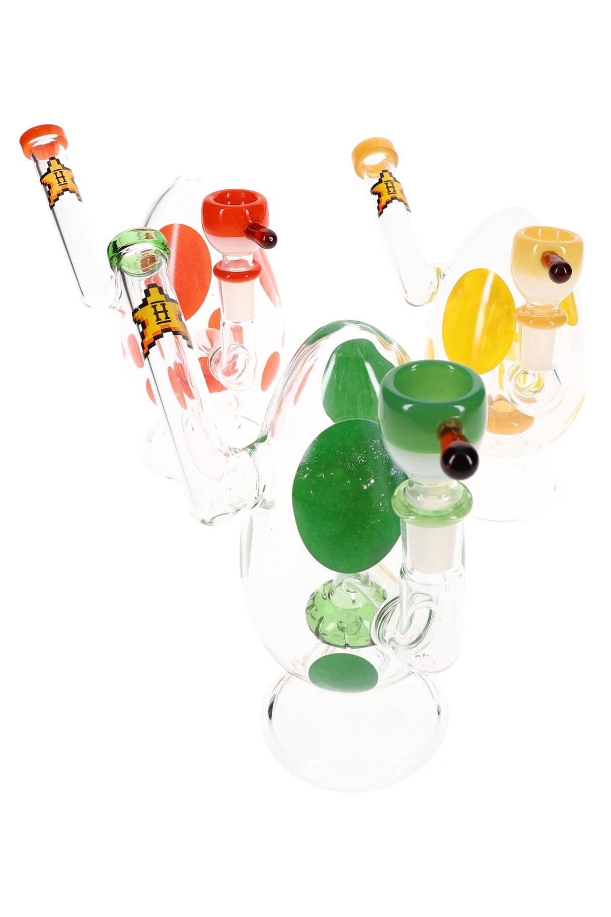 Group of green, orange, and yellow spotted egg glass bongs arranged together to show assorted color options.