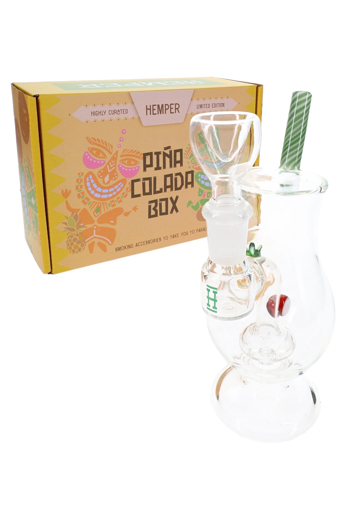 Hemper Pina Colada mini glass bong beside bright Piña Colada Box packaging, tropical themed water pipe display.