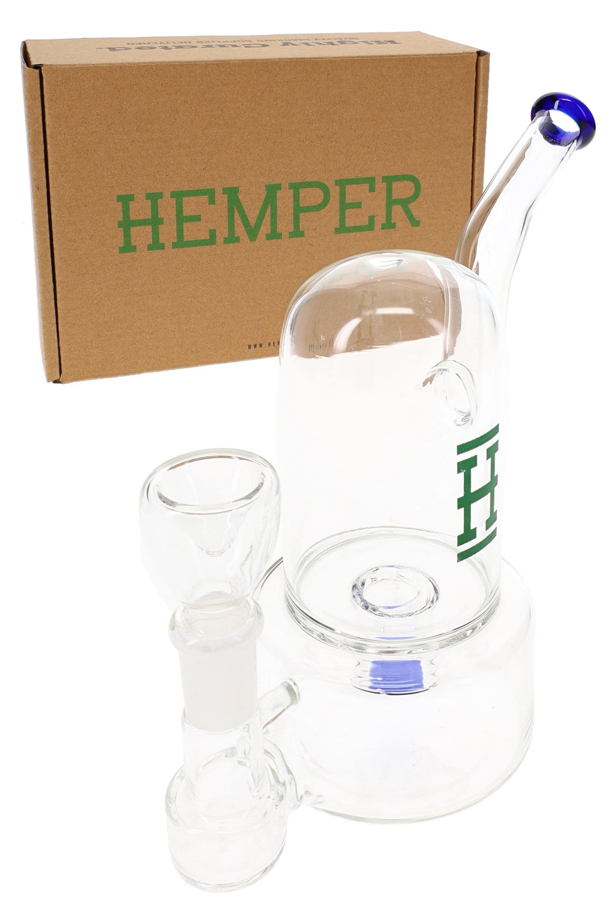 Hemper bell glass bong in front of kraft HEMPER box, showing clear bell dome, blue mouthpiece accent and included flower bowl.