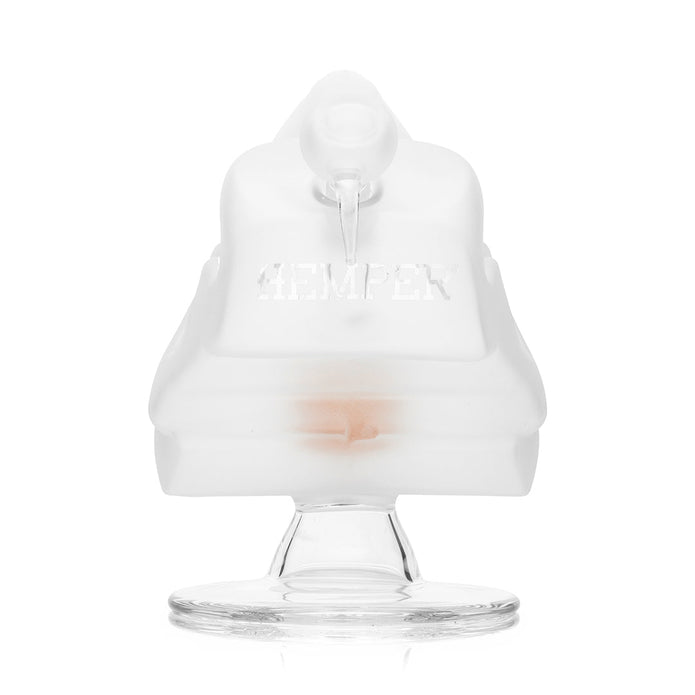 Rear view of frosted skull glass bong showing HEMPER embossing and top mouthpiece opening on a clear pedestal base