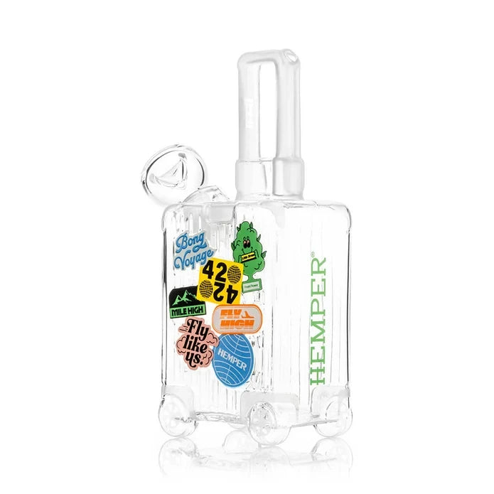 Angled view of the HEMPER Mile High Suitcase Medium Bong showing colorful graphics and sculpted wheels