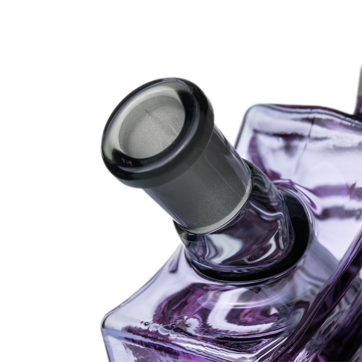 Close-up of MJ Arsenal Nightcrawler dab rig 10 mm female joint with frosted glass connection above purple web body