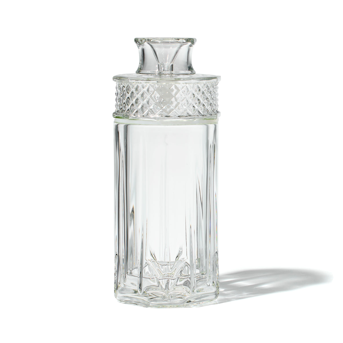 NWTN Home Highball glass gravity bong in Clear with transparent faceted shell and textured upper collar