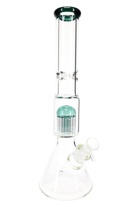 Clear beaker bong with dark green mouth rim and matching dome over tree perc, angled downstem joint at base.