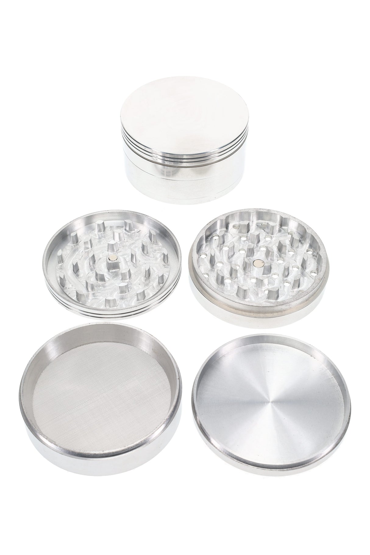 Large 4-part metal herb grinder with magnetic lid and textured grip, showing grind chamber, mesh screen, and kief catch.