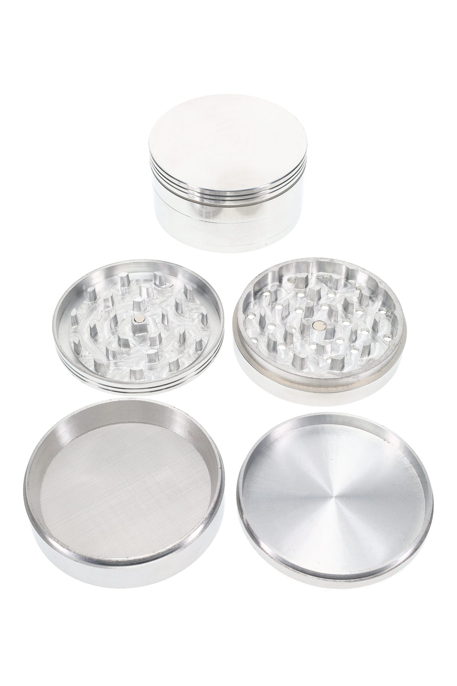 Large 4-part metal herb grinder with magnetic lid and textured grip, showing grind chamber, mesh screen, and kief catch.