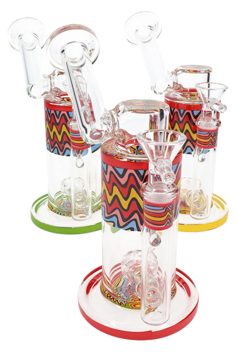 Trio of 7″ stemless sidecar glass bongs with reverse-work bands, showerhead percs, and color bases in red, yellow, and green.