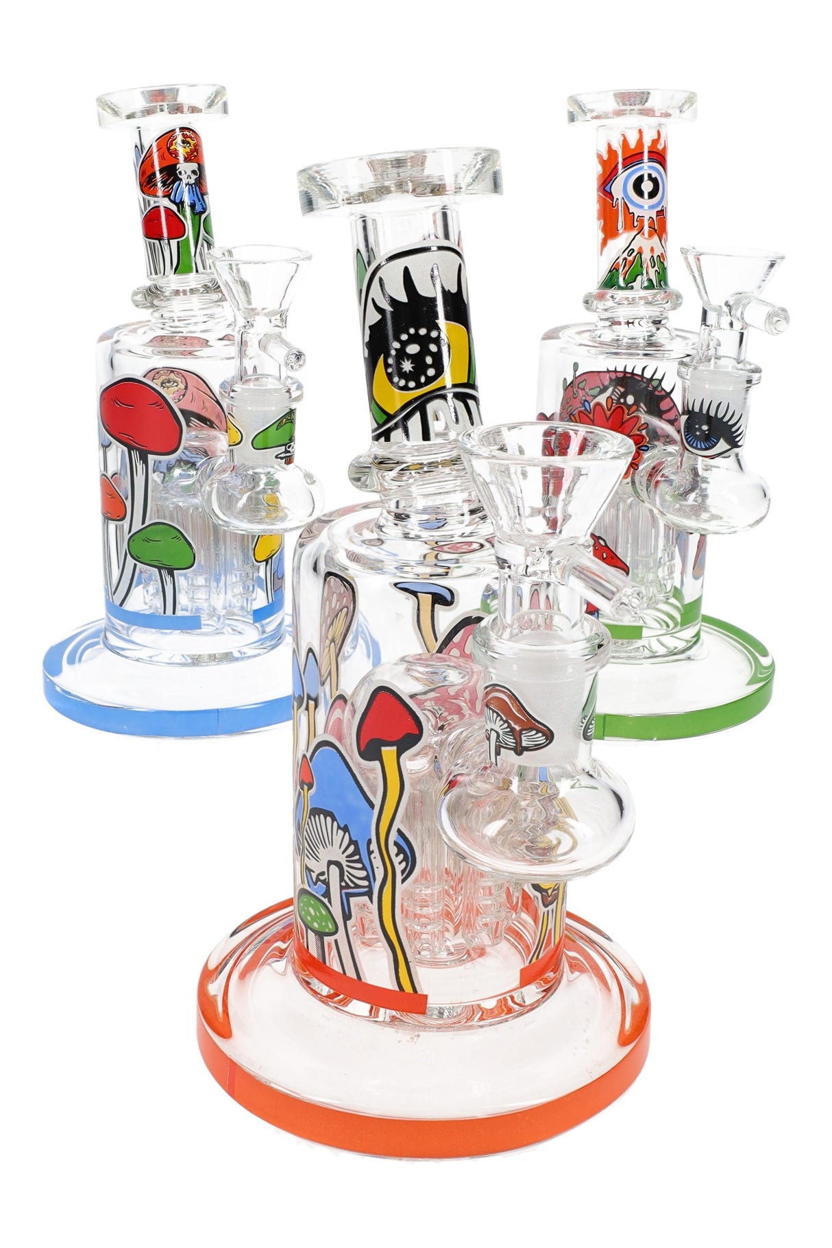 Daylight trio of 6.5″ mushroom bongs with tree percs, mixed rim colors and bold eye-and-shroom graphics.
